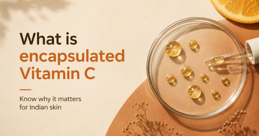 Petri dish with golden droplets and text: What is encapsulated Vitamin C, and why it matters for Indian skin.